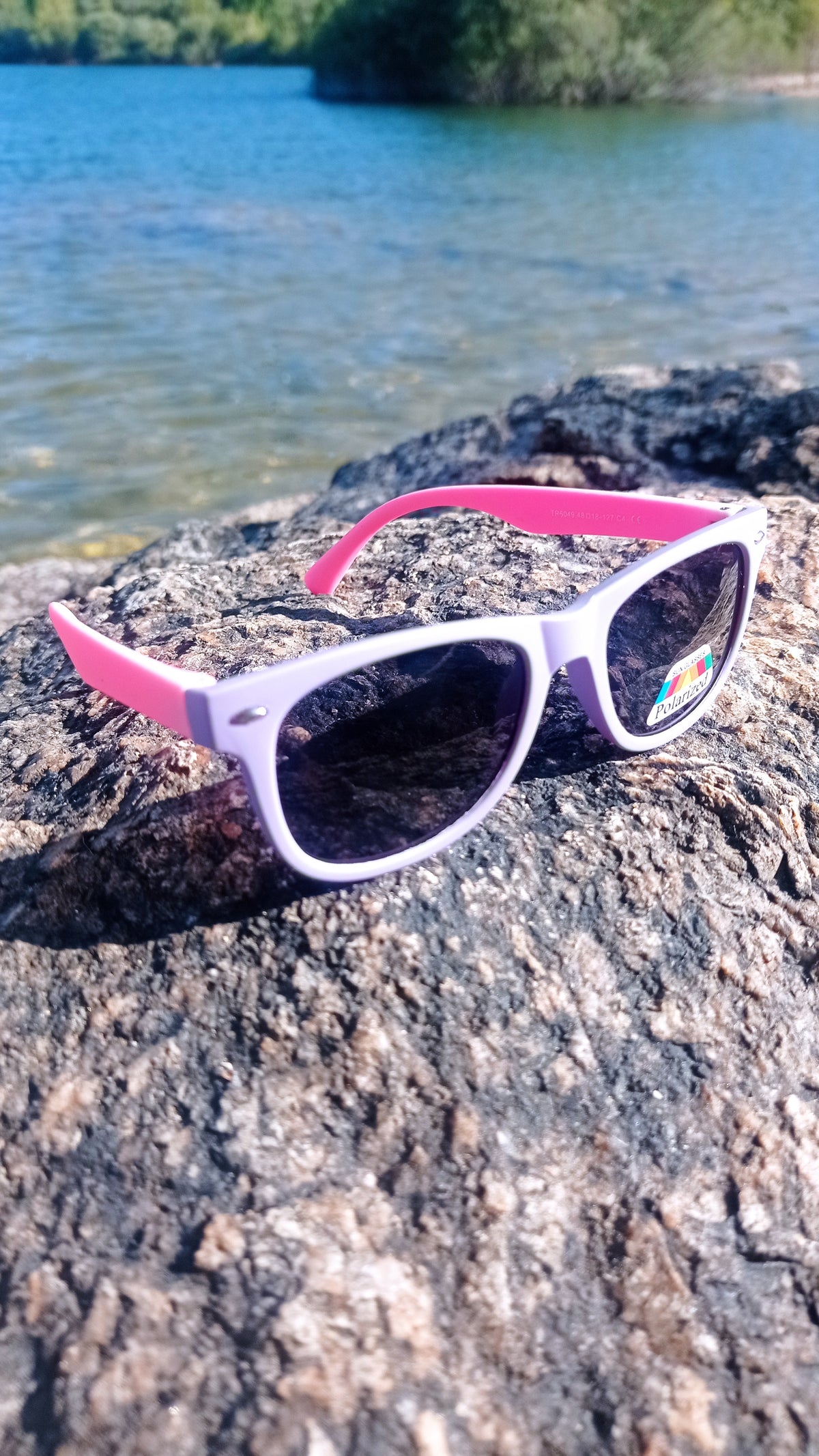 Children's sunglasses in different colours.