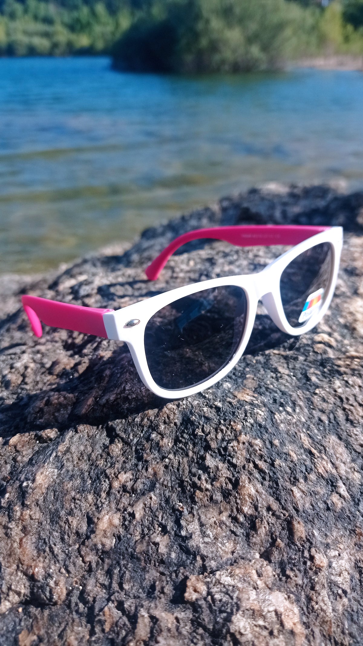 Children's sunglasses in different colours.