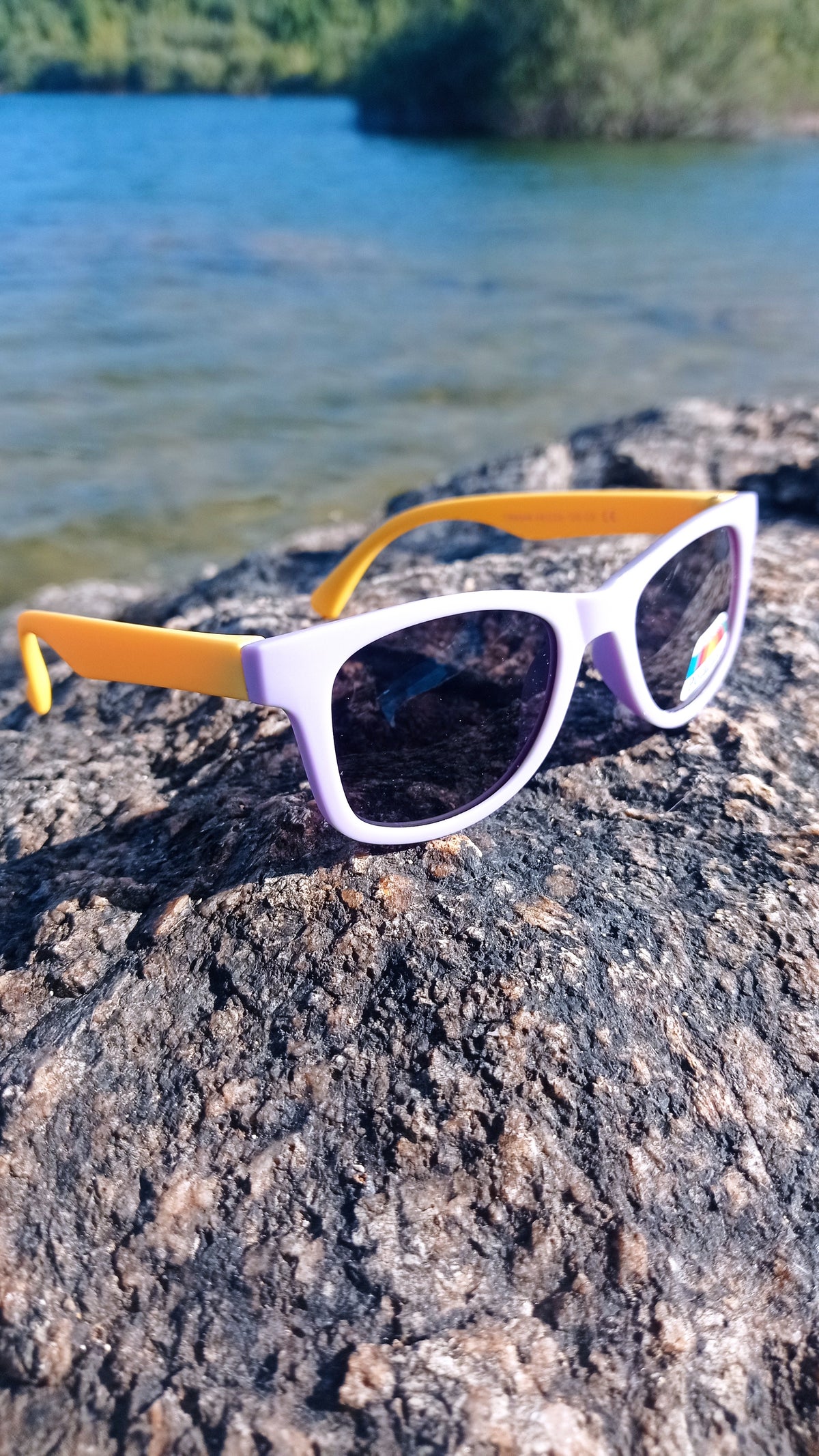 Children's sunglasses in different colours.
