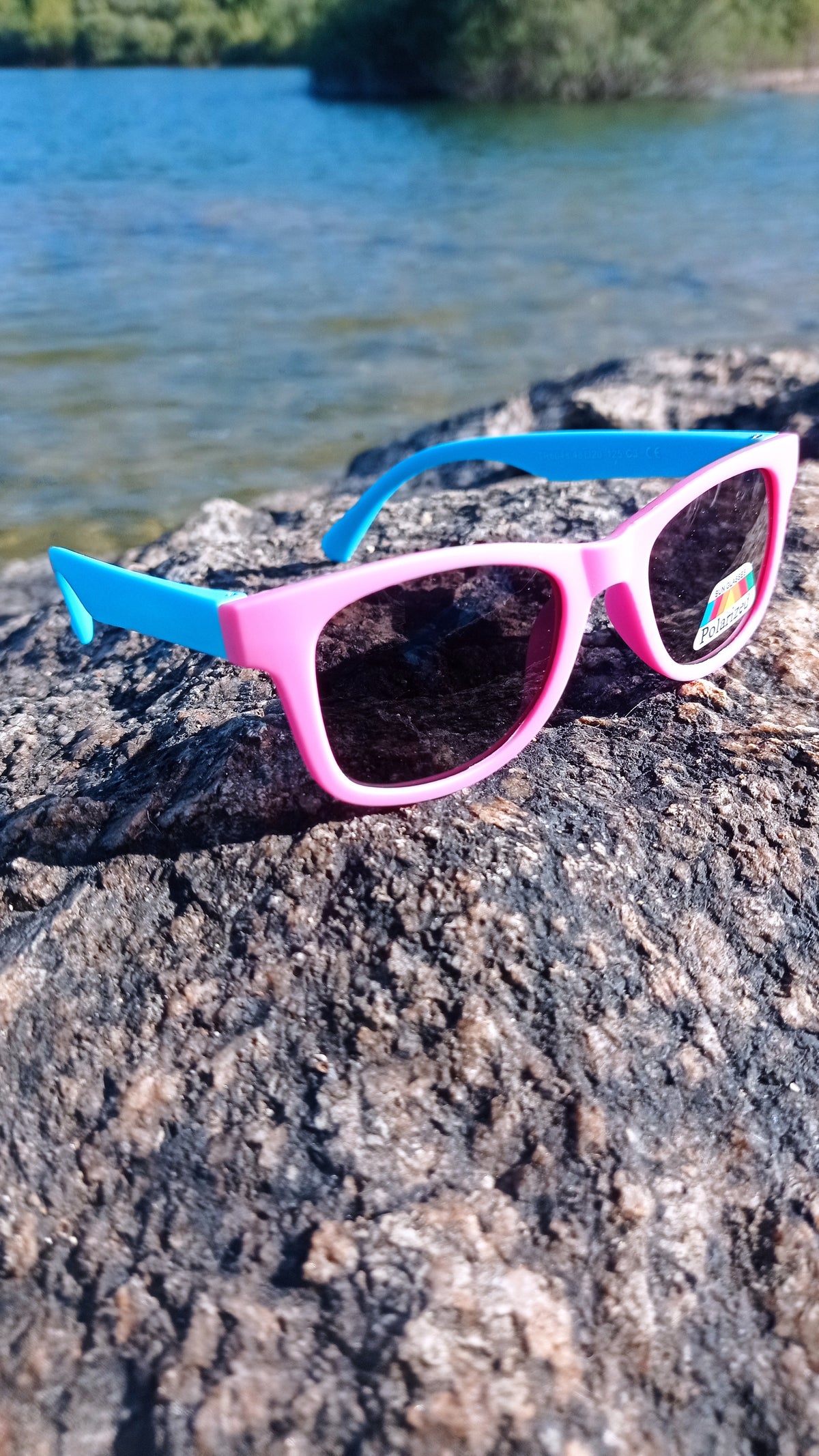 Children's sunglasses in different colours.