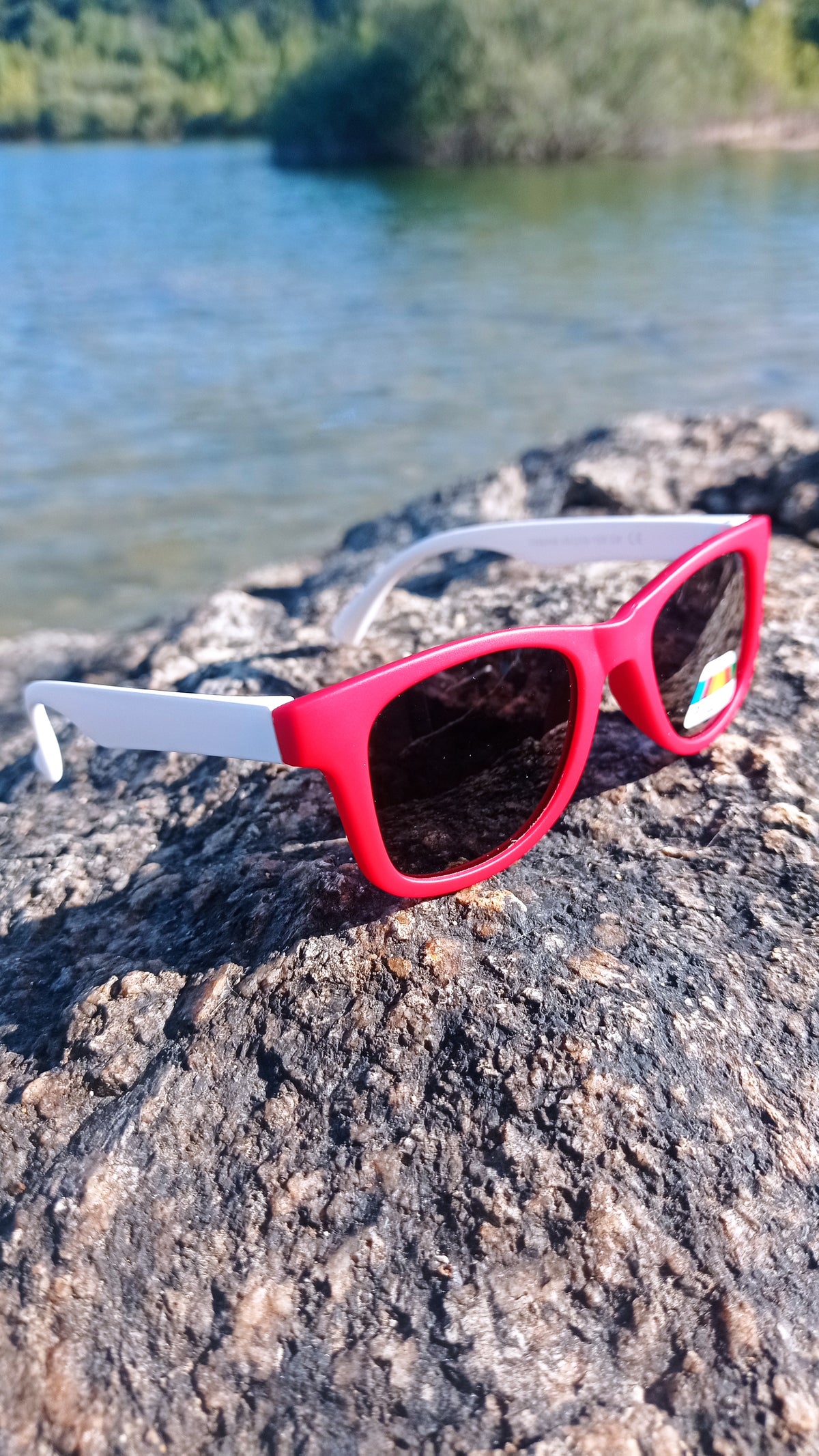Children's sunglasses in different colours.