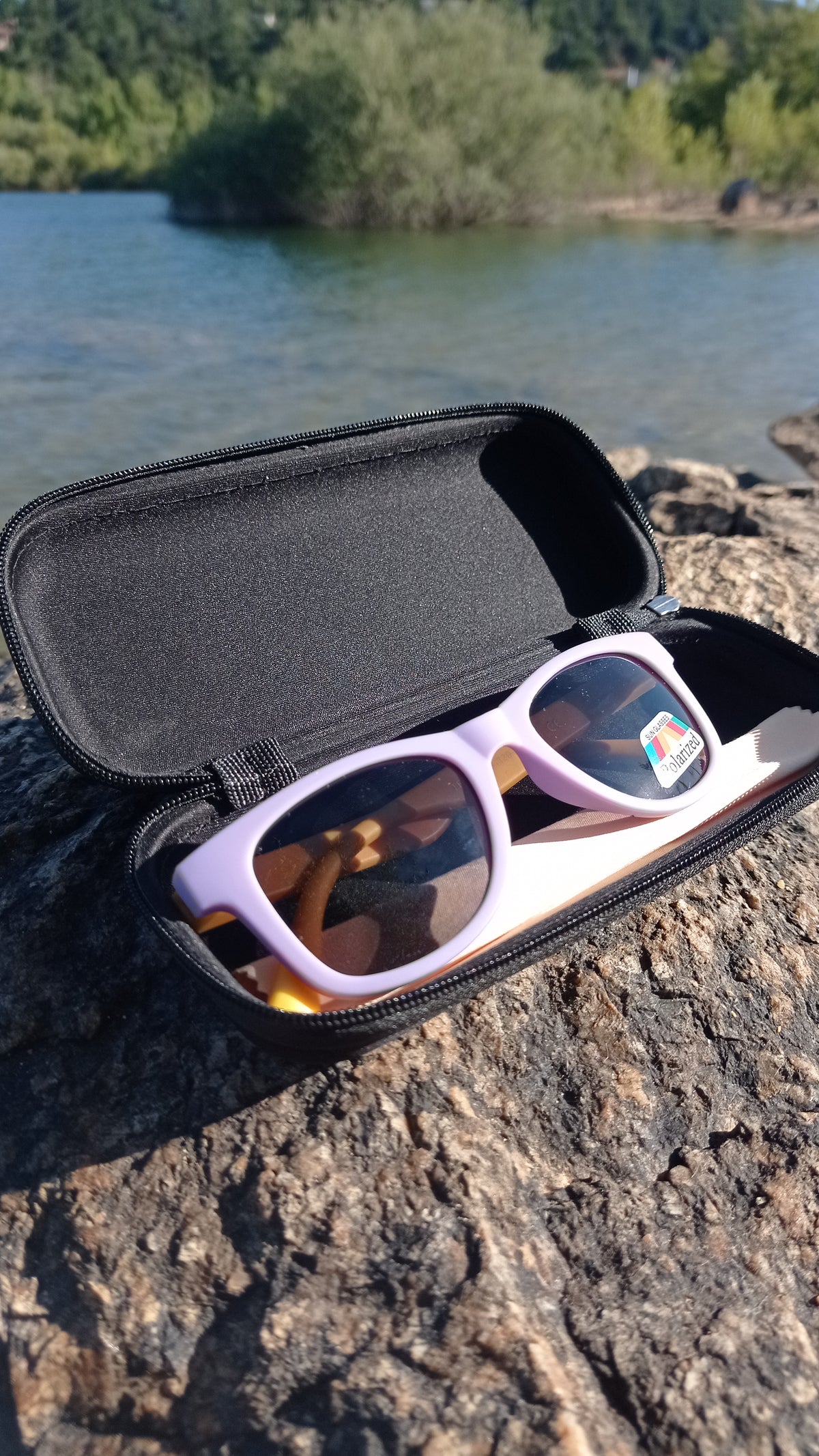 Children's sunglasses in different colours.